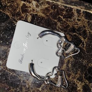 Hollow skull face earrings